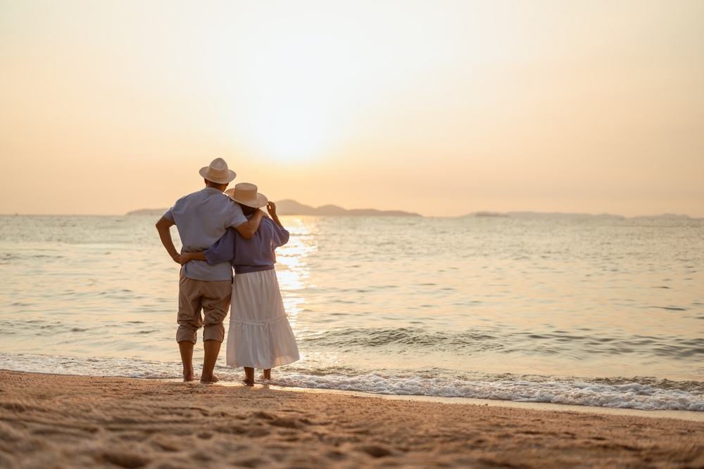 Retired,,retirement,,couple,,senior,,elderly,,beach,,recreation,,insurance,,planning,,vacation.
